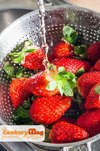 strawberry jam in colander